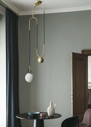 Cradle Brass mid century pulley pendant light | Bright & Plus.